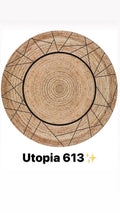 Round natural fiber rug with black geometric border pattern, modern washable design