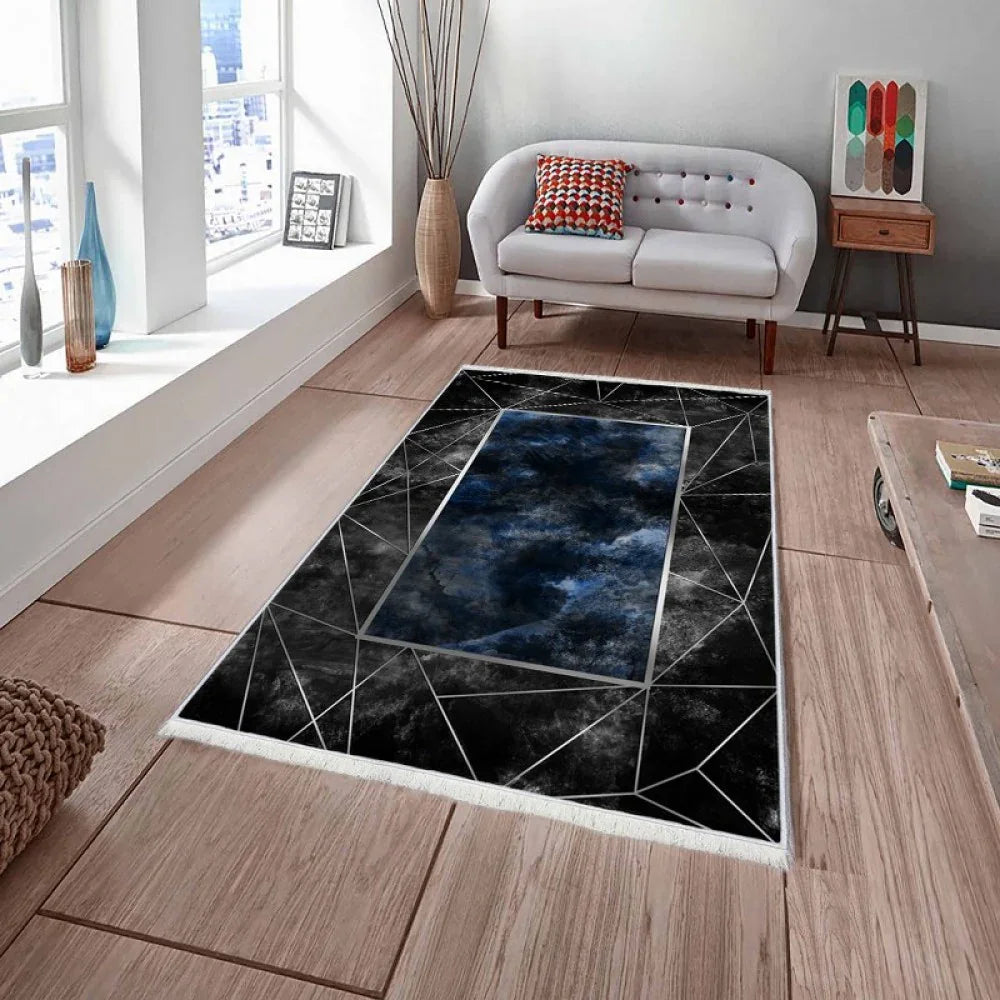 Waschbarer Teppich mit geometrischem Muster und dunkelblauem Zentrum, ideal für moderne Wohnzimmer