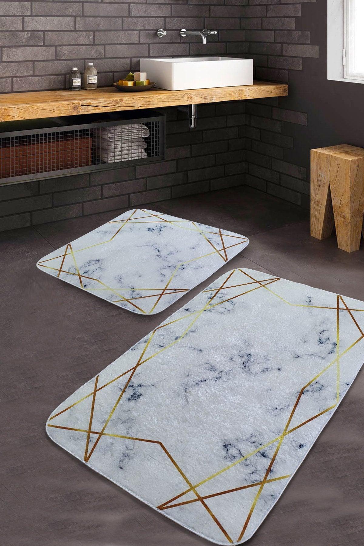 Modern bathroom with two washable rugs, marble pattern and gold geometric lines